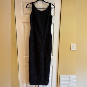 Absolutely stunning navy blue gown. Includes bolero jacket. Size 4.